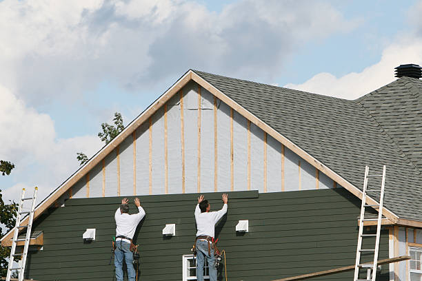 Professional Siding technician working in King William, VA